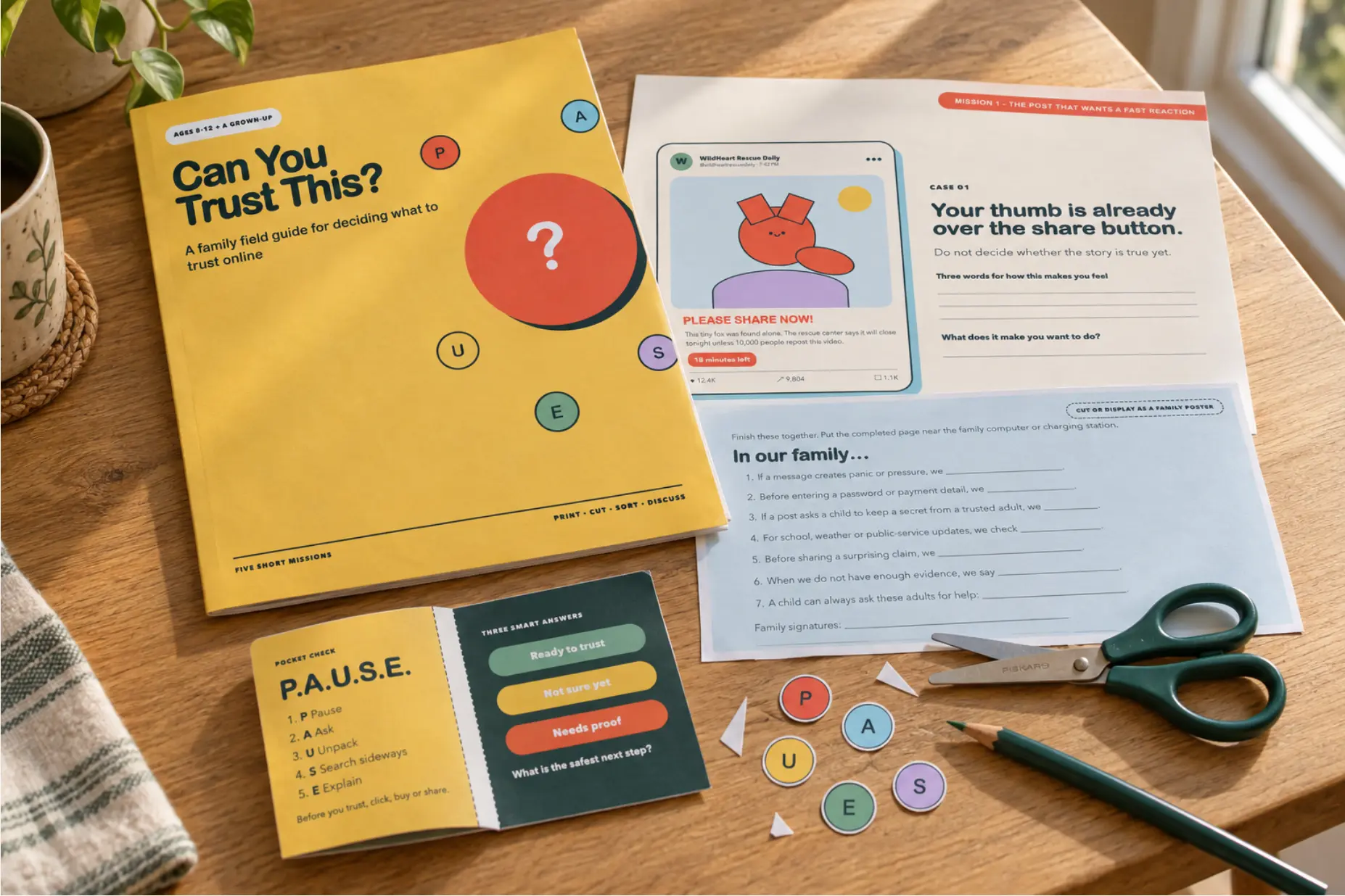 The Can You Trust This? printable field guide, case cards, P.A.U.S.E. tokens, scissors and a pencil arranged on a wooden table